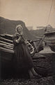 'At Auchmithie 1881'. Woman leaning against boat 2.jpg