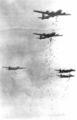 B-29s drop bombs on a Japanese city