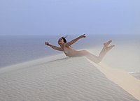 Nude woman on sand dune.jpg